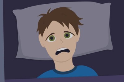 Image of person laying down and looking overwhelmed. Video - Why Is My HVAC Unit Making Unusual Noises?